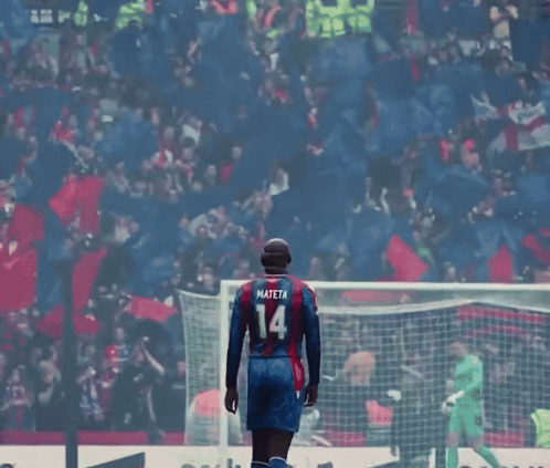 Soccer Player Mateta 14 in Front of Crowd