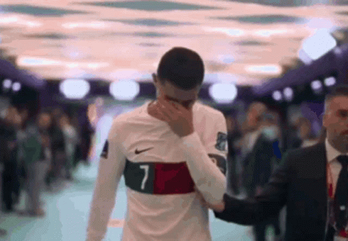 Soccer Player No. 7 Covering Face