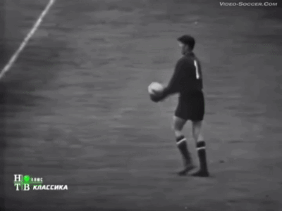 Soccer Player Number 1 Catches Ball