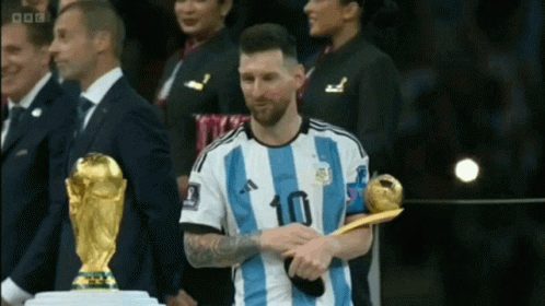 Soccer Player Number 10 Holding Trophy