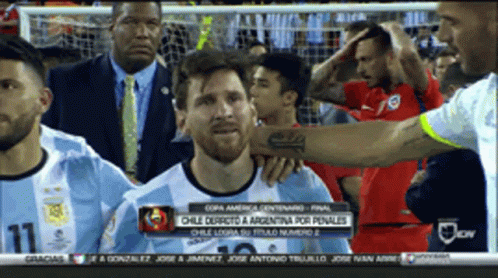 Soccer Player Number 10 Hugged by Another Player