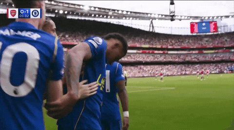 Soccer Player Number 10 Hugging Another Player