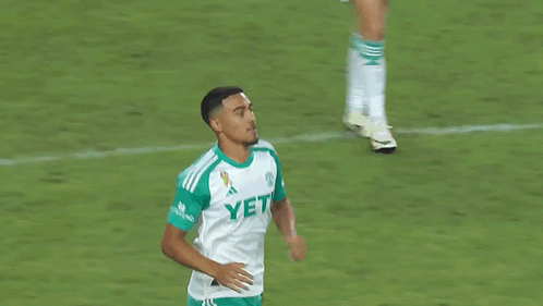 Soccer Player Number 10 Hugging Another Player GIF