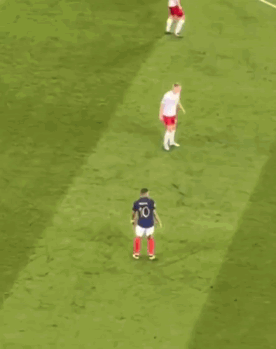 Soccer Player Number 10 Kicking Soccer Ball
