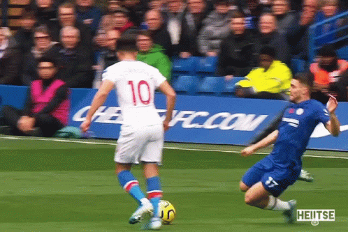 Soccer Player Number 10 Kicks Ball GIF