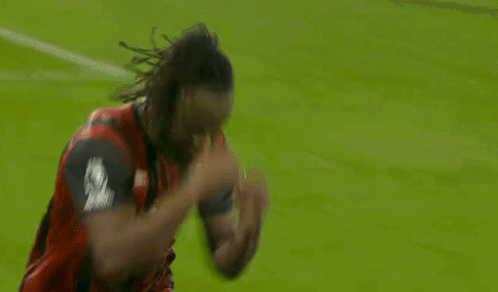 Soccer Player Number 10 Lying on Ground