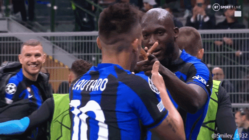 Soccer Player Number 10 Surrounded by Teammates