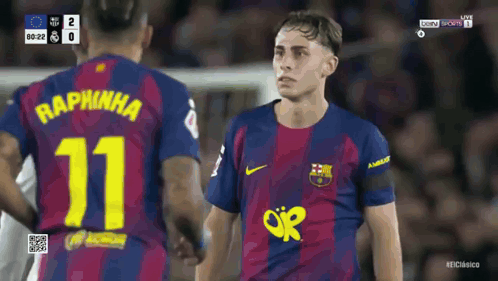 Soccer Player Number 11 Talking to Another Player
