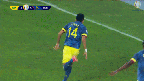 Soccer Player Number 14 Celebrating