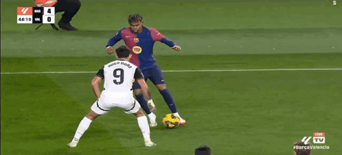 Soccer Player Number 16 Surrounded by Two Players