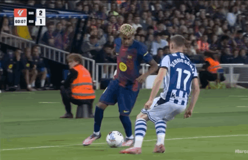 Soccer Player Number 17 Kicking Ball