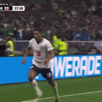 Soccer Player Number 18 Running on Field