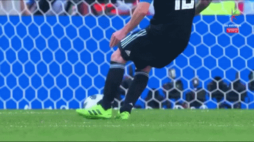 Soccer Player Number 19 Kicking Ball