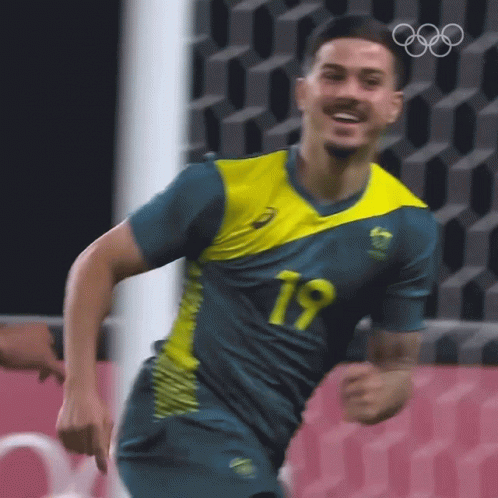 Soccer Player Number 19 Running