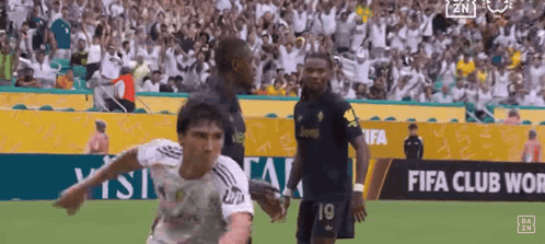 Soccer Player Number 19 Running