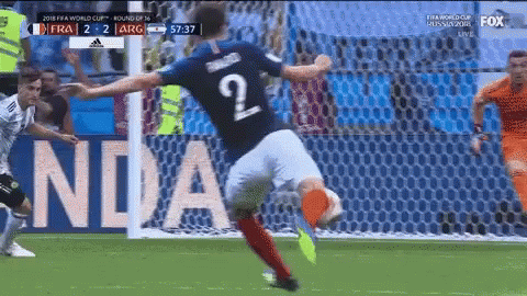 Soccer Player Number 2 Kicking Ball