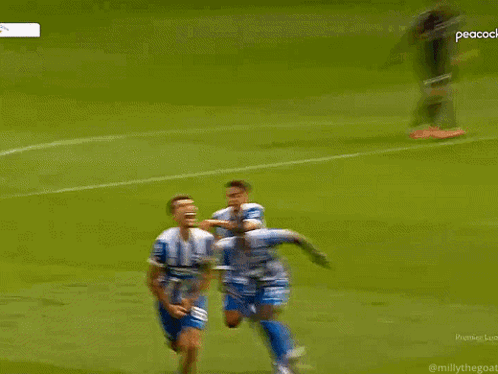 Soccer Player Number 24 Being Tackled