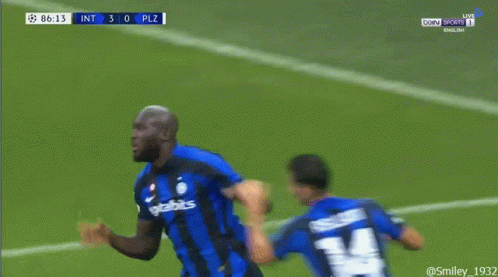 Soccer Player Number 24 Tackled by Another
