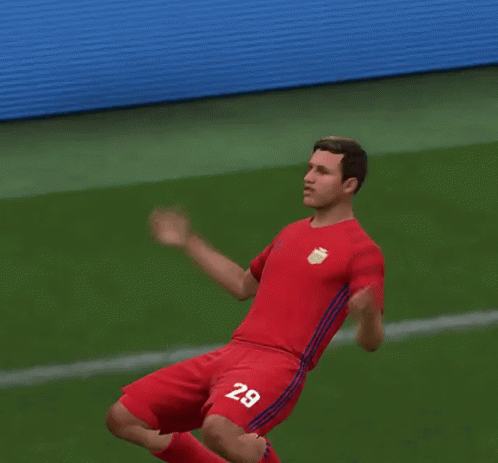 Soccer Player Number 29 Kneeling on Field