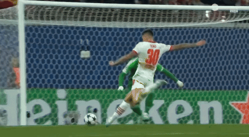 Soccer Player Number 30 Kicking Ball