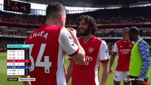 Soccer Player Number 4 Jersey Shakes Hands