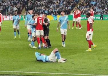 Soccer Player Number 4 Lying On Ground GIF