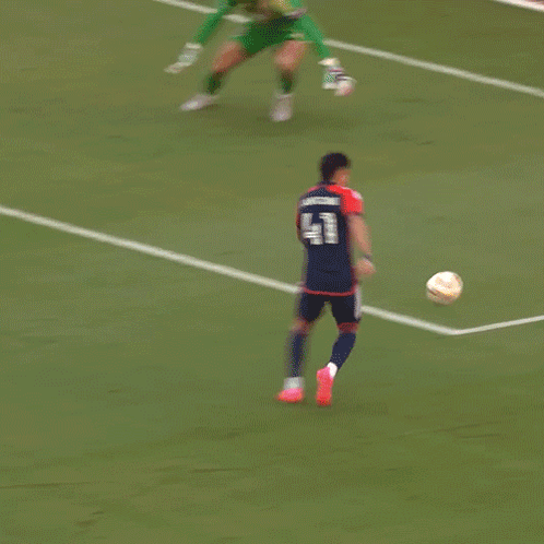Soccer Player Number 41 Kicking Ball
