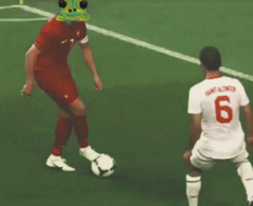 Soccer Player Number 6 Kicking Ball