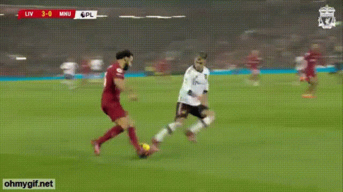 Soccer Player Number 6 Kicks Ball GIF