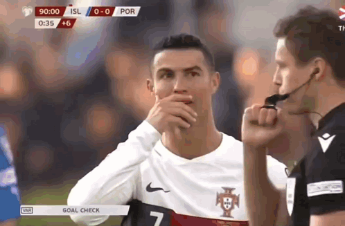 Soccer Player Number 7 Covering Mouth