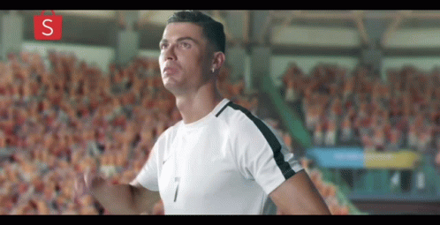 Soccer Player Number 7 Running Before Crowd