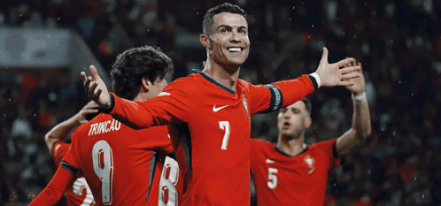 Soccer Player Number 7 Surrounded by Teammates
