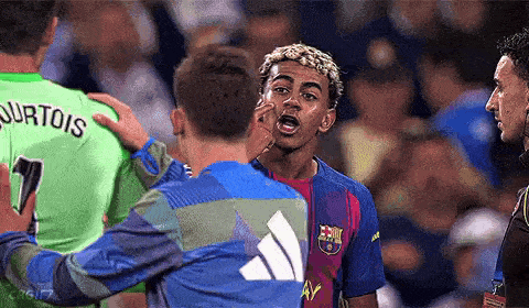 Soccer Player Number 7 Talking to Another Player