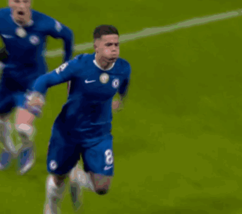 Soccer Player Number 8 Running on Field