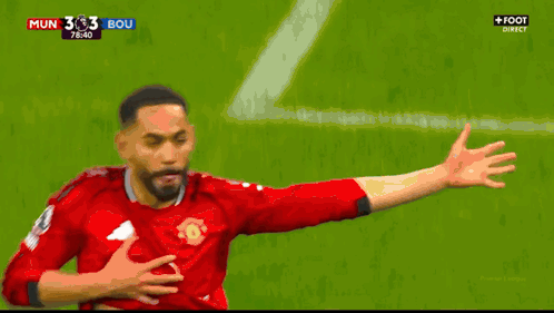 Soccer Player Number 9 Hugged