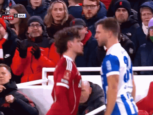 Soccer Player Number 9 Jersey Next To Player In Red Jersey GIF