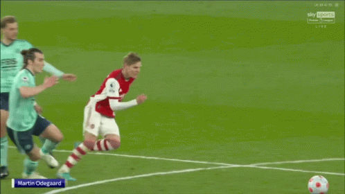 Soccer Player Number 9 Kicks Ball GIF