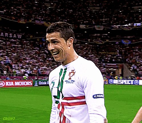 Soccer Player on Field with Kia Motors Advertisement