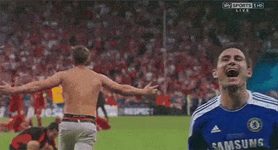 Soccer Player Raising Arms