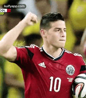 Soccer Player Red Jersey Number 10 Holding Ball GIF