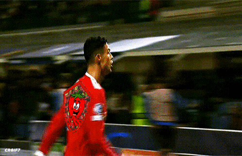 Soccer Player Red Shirt With Tomato on Back