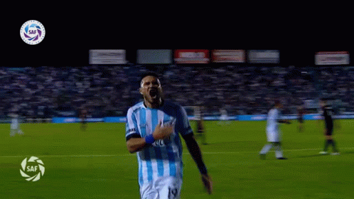 Soccer Player Running on Field with Saf Logo