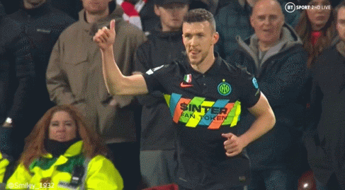 Soccer Player Running With Arms Outstretched