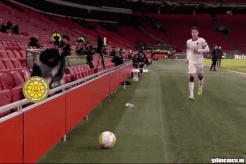 Soccer Player Running With Heineken Logo GIF