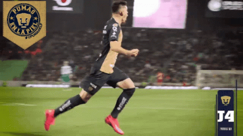 Soccer Player Running with Pumas Logo