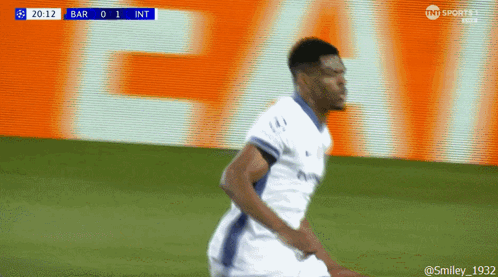 Soccer Player Running with TNT Sports Logo