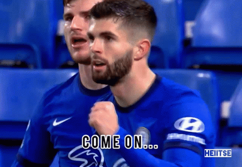 Soccer Player Saying Come On to Teammate