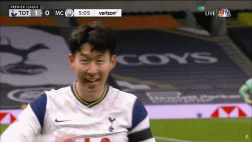 Soccer Player Smiling During Match