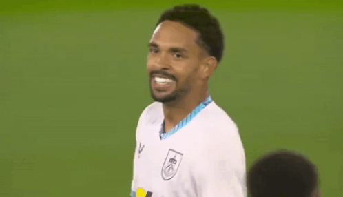 Soccer Player Smiling on Field