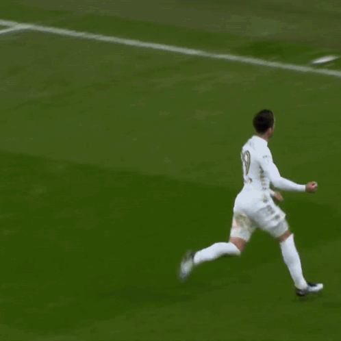 Soccer Player Standing In Front Of 32R Sign GIF